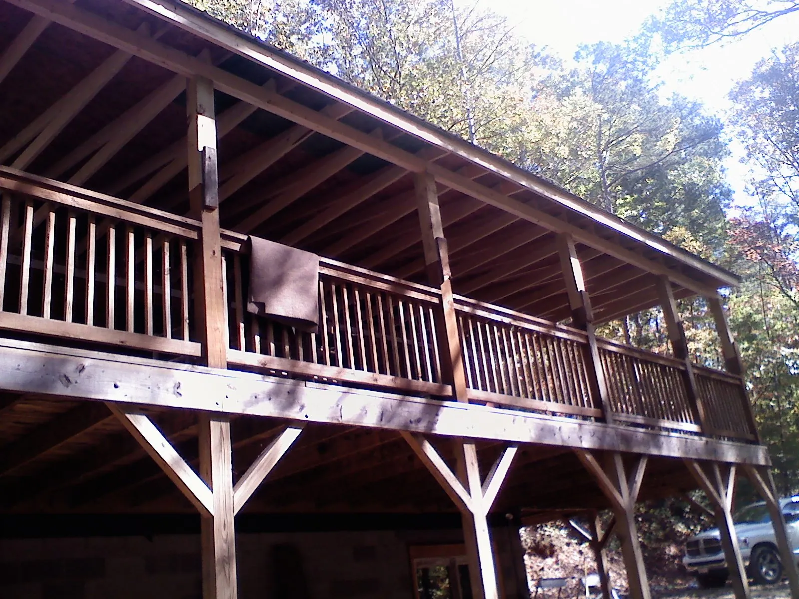 Timber framing under a new elevated porch and deck — Roof Leak Repair in New Bedford by Roofing Brothers